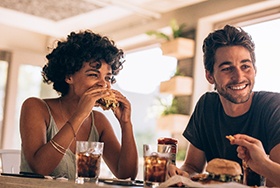 Friends enjoying meal together at restaurant