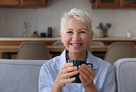 Woman smiling on a couch