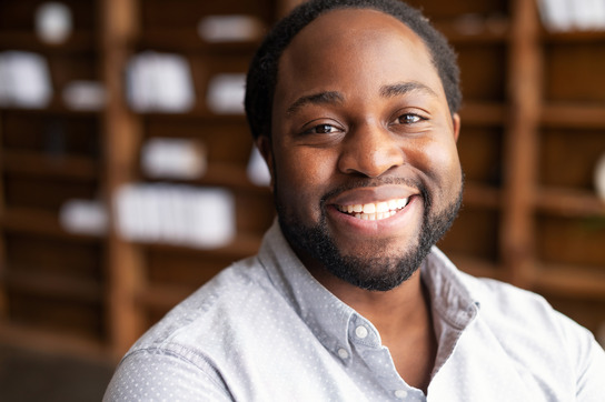 closeup of person smiling after getting dental implants 